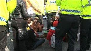 A small number of protesters blocked the road outside the Lib Dem conference venue