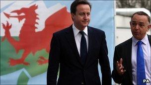 Prime Minister David Cameron accompanied by Nick Bourne, leader of the Conservative group in the Welsh Assembly