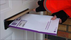 A census form being delivered