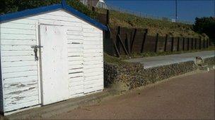 The space where the beach huts once stood