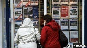 Looking in an estate agent's window