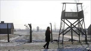 Visitor at Auschwitz death camp, Poland (1 February 2011)