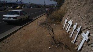 Makeshift memorial across the road from the Tucson Safeway where the shooting took place