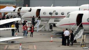 Private business jets parked on the tarmac