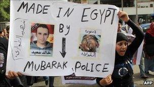 Egyptian activists protest against torture in police stations in Cairo, June 2010