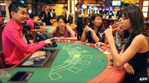 Customers at a gambling table