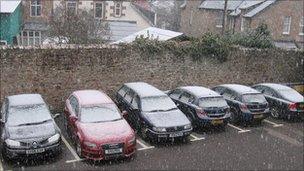 Snow on cars in Inverness