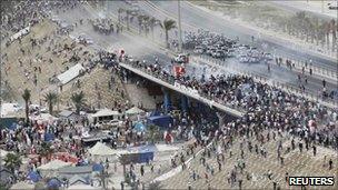 Violent clashes on a flyover near Pearl Square in Manama