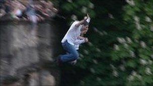 The revellers jumping from Magdalen Bridge in Oxford