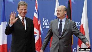 German Foreign Minister Guido Westerwelle (L) with French Foreign Minister Alain Juppe (15 March 2011)