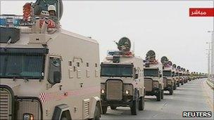 Saudi Arabian troops cross the causeway leading to Bahrain in this still image taken from video March 14, 2011.