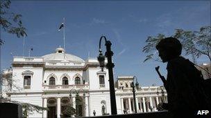 Soldier stands guard outside the parliament building.