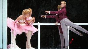 Gennady Yanin dancing in Cinderella at the Bolshoi Ballet in London with the Ugly Sisters (Anastasia Vinokur and Lola Kochetkova)