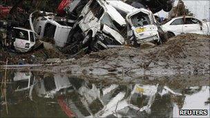 destroyed vehicles in Sendai