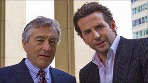 Robert De Niro and Bradley Cooper in Limitless