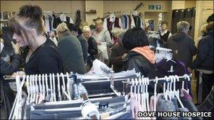 Shoppers at a Dove House Hospice store