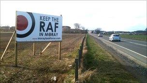 keep raf in moray sign on grass verge