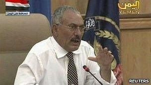 Yemen's President Ali Abdullah Saleh meets with defence force officials in Sanaa in this still image taken from video on 21 March 2011