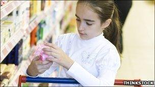 Child with shopping trolley [Thinkstock]