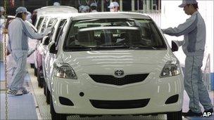 Workers give the final check toyota cars