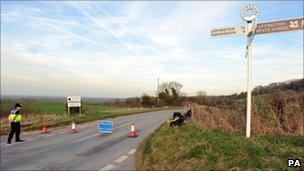 Police man a roadblock near the village of Uffington