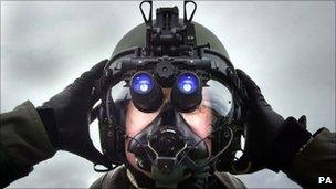 RAF pilot wearing night vision goggles