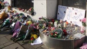 Floral tributes outside the Suju nightclub