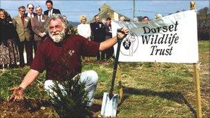 David Bellamy plants a tree to celebrate the opening of DWT’s HQ at Brooklands Farm, Forston in 1995. Copyright of Dorset Wildlife Trust.