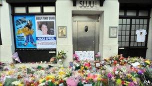 Floral tributes outside the Suju nightclub