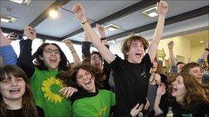 Green party supporters celebrate the exit polls in Stuttgart, 27 March