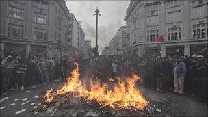 A trojan horse burnt by protesters in Oxford Circus