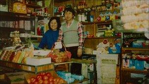 Sunhee and SeoJun Kim in their grocery store (Image courtesy of Ronald Kim)