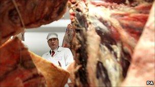 Iain Gray at a meat processing factory