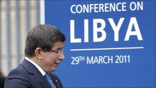 Turkish Foreign Minister Ahmet Davutoglu arrives at Lancaster House to attend the London Conference on Libya, 29 March 2011