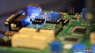 Semiconductors are seen on a circuit board that powers a Samsung video camera