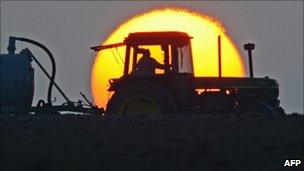 Tractor against a sunset