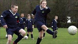 Children playing football