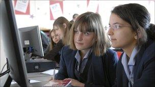 School students work on a computer