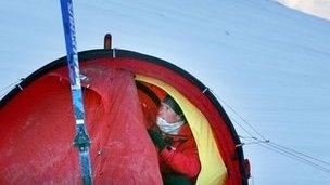 Prince Harry sets up his tent on the island of Spitzbergen