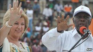 Alassane Ouattara (right) and his wife Dominique in 2009