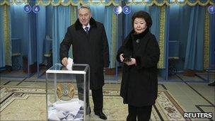 Kazakh President Nursultan Nazarbayev and his wife Sara cast their votes at a polling station in Astana