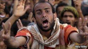 An anti-government protester shouts slogans in Sana'a. Photo: 4 April 2011