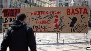 A billboard in Lisbon calling for workers' rights