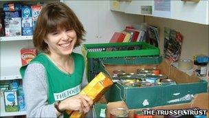 Volunteer sorting donated food