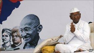 Anna Hazare gestures during his hunger strike in Delhi, Friday, April 8, 2011