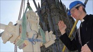 Stone cross installed at Salisbury Cathedral