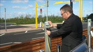 Motorbike being charged at Taunton Park and Ride