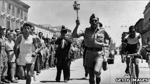 The Torch is carried by a Bersagliere in Bari