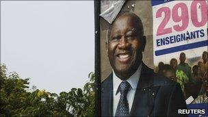 An election billboard showing ousted former president Laurent Gbagbo in Abidjan April 14, 2011