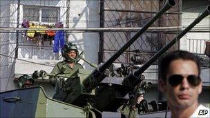 Cuban soldiers rehearse for an upcoming parade to commemorate the 50th anniversary of the Bay of Pigs at the Plaza de la Revolution in Havana, Cuba, Thursday April 14, 2011